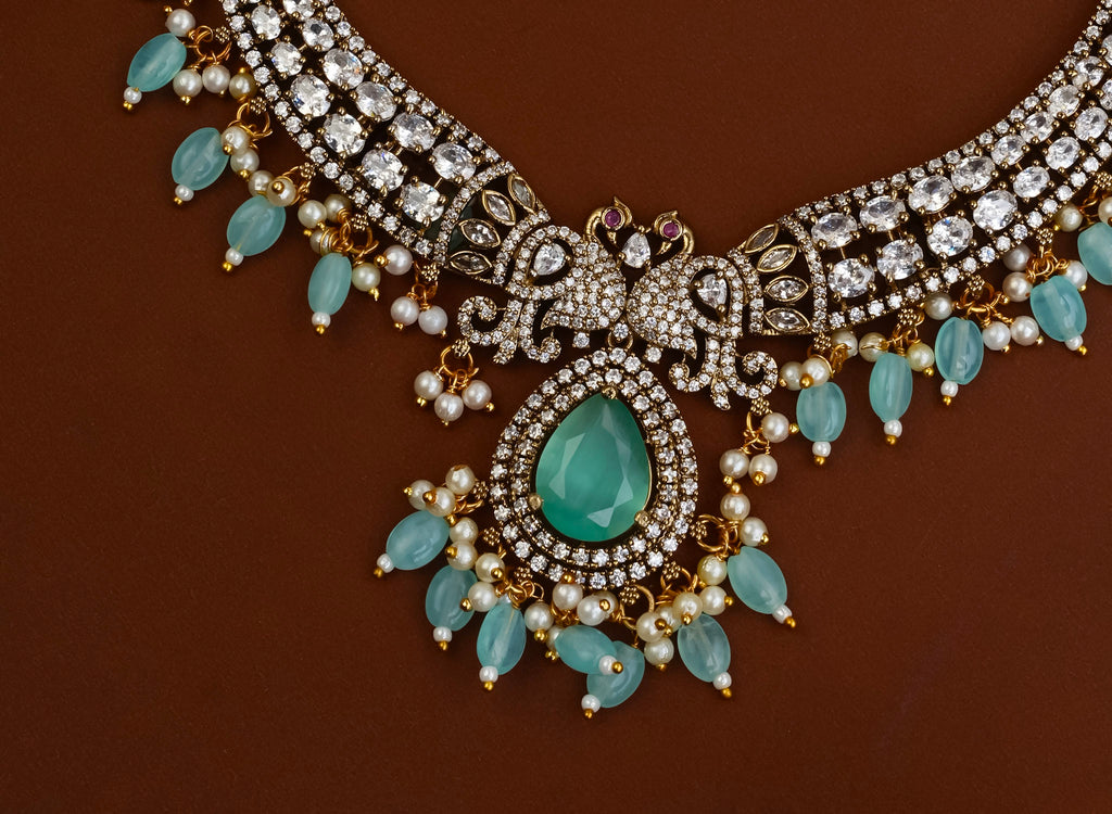 VICTORIAN PEACOCK HASLI (MINT)
